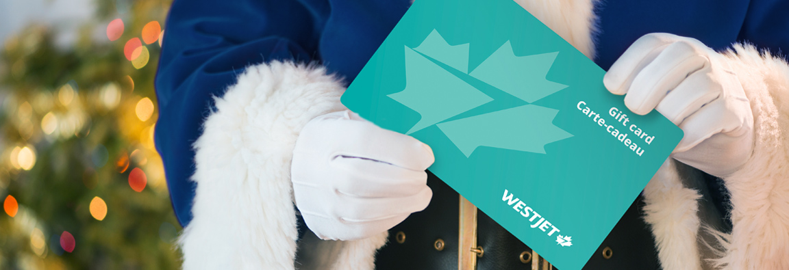 Santa Claus azul sosteniendo una tarjeta de regalo de WestJet 