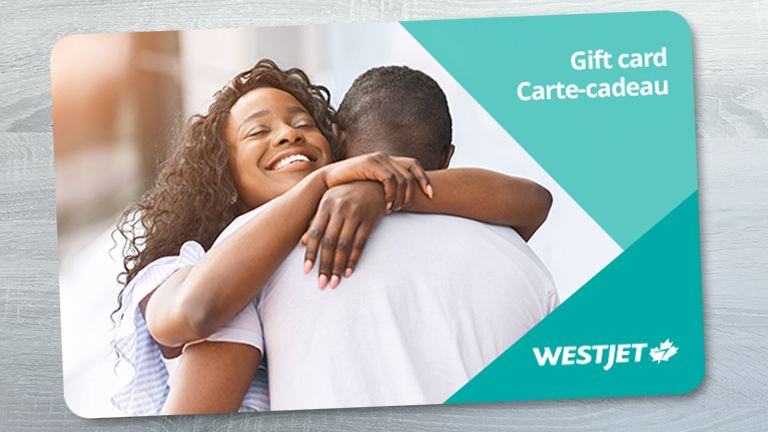 WestJet gift card, two people hugging