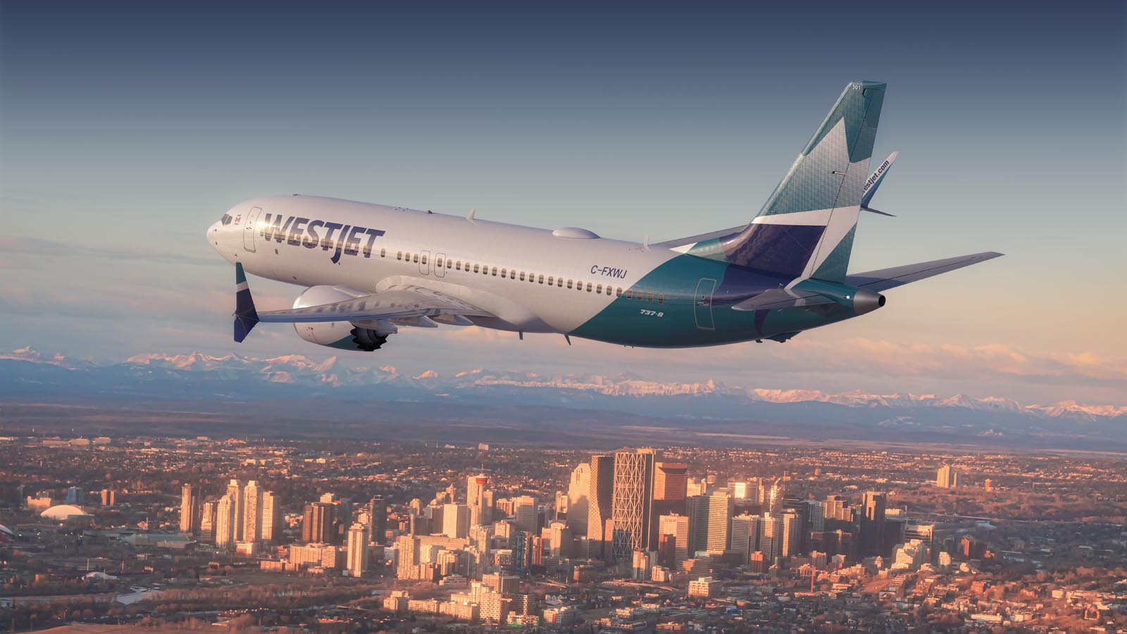 WestJet Boeing MAX 8 aircraft flying over Calgary Canada