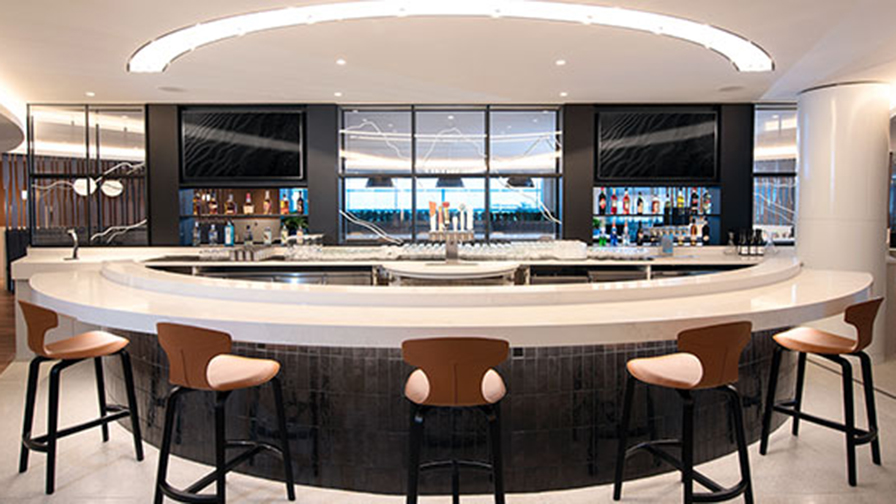 Bright rounded bar in Elevation Lounge