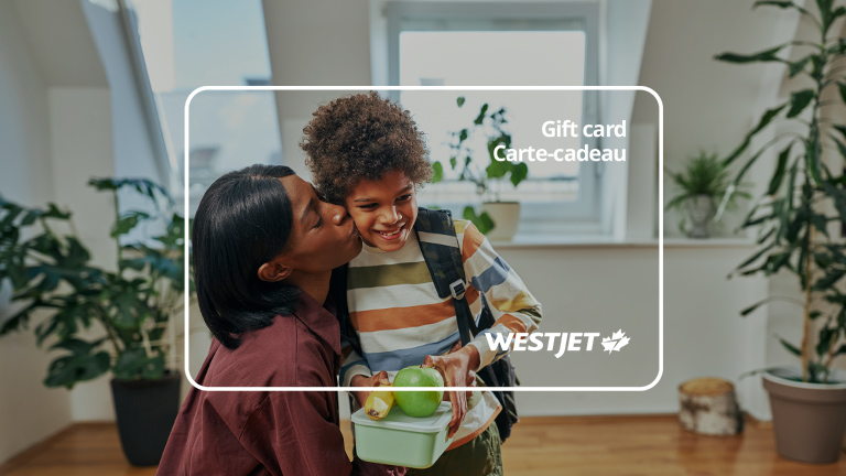 Person with child with a WestJet Gift Card overlay