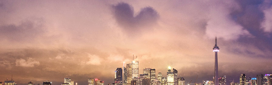 Toronto night skyline with heart in the clouds 