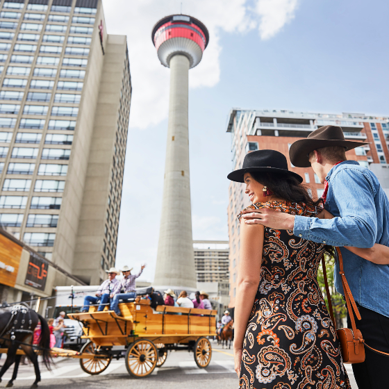 Couple watching the Calgary Stampede Parade