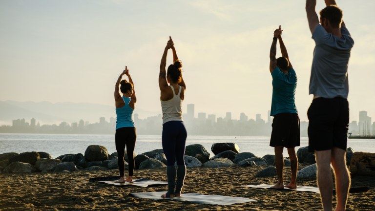 Vancouver yoga on beach