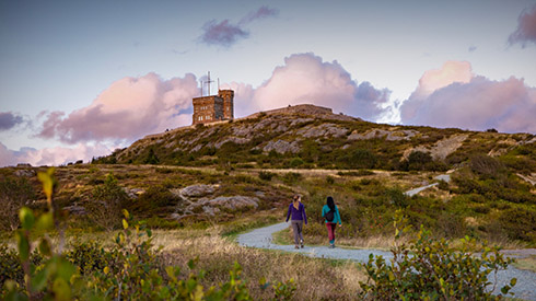 People Walking at Signal Hill at Sunset