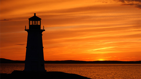 Peggy's Point Lighthouse at sunset