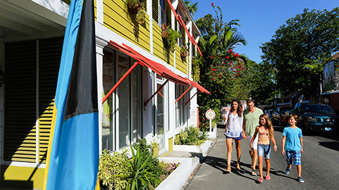 A family walking into the Graycliff Heritage Museum in Nassau