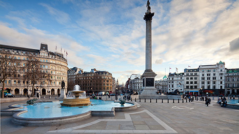 View of fountains and Nelson's Column at Trafalgar Square in central London