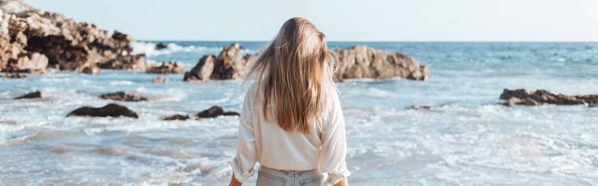 young woman on beach in puerto escondido