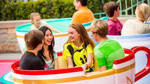 Guests on the Mad Tea Party ride at Disneyland Resort in California
