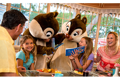 Chipmunks signing autographs at a family breakfast