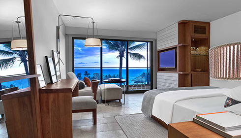 Chambre Andaz avec très grand lit et vue sur l'océan