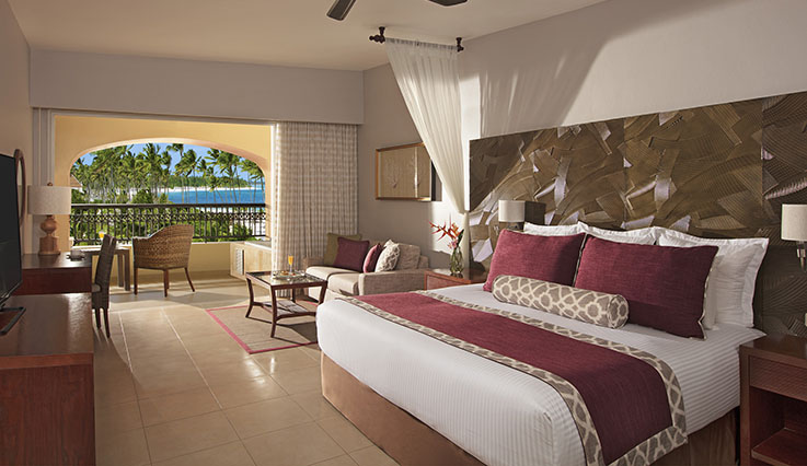 Chambre de luxe Preferred Club avec vue partielle sur l’océan - Très grand lit