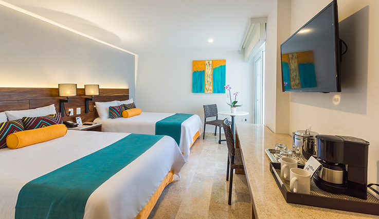 /content/dam/westjet/images/hotels/pvr/pvrbag-buenaventura-grand-hotel-and-spa/rooms/pvrbag-resort-room-renovated.jpg