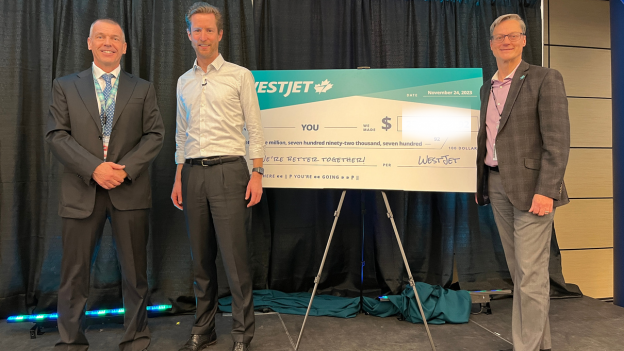 Chief Executive Officer, Alexis von Hoensbroech alongside Chris Burley, Chairman of the WestJet Group's Board of Directors and Mike Scott,  WestJet Group Executive Vice-President and Chief Financial Officer