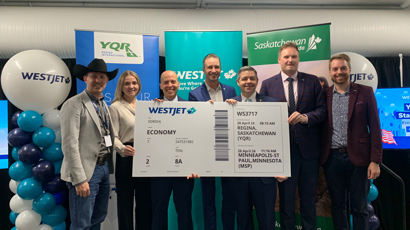 WestJet’s latest investments in Regina were celebrated today at a special event at the Regina International Airport, alongside notable partners including from left: Shaun Kindopp. CEO of Agribition, Tara Jago, WestJet, Senior Manager, External Affairs, James Bogusz, CEO Regina Airport Authority, Jared Mikoch-Gerke, WestJet, Director Alliances & Airport Affairs, Hon. Jeremy Harrison, Government of Saskatchewan Minister of Trade and Export Development, Tyler Willox, Regina Airport Vice-Board Chair, Justin Reves, Regina Airport Authority, Director, Revenue Development, Public Relations and Customer Experience 