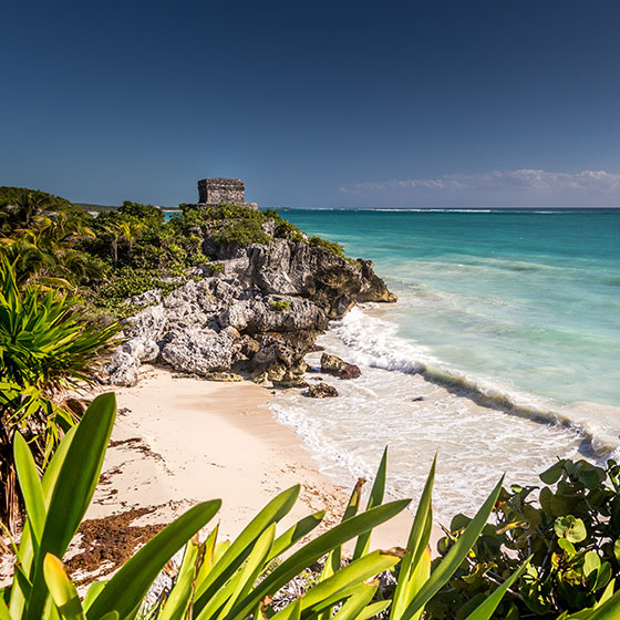 woman lounging in an infinity pool