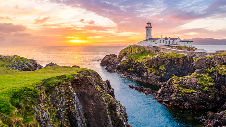 Lighthouse in Europe at sunset