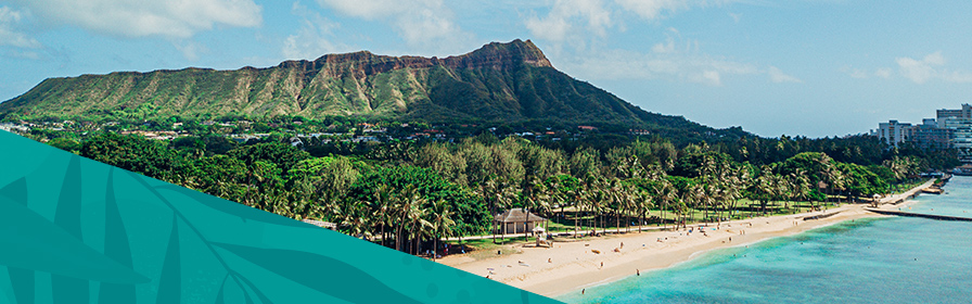 Hawaiian beach with mountains in the background