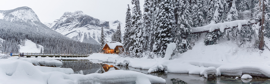 Cabin on a snowy lake