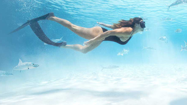Girl snorkelling in Nassau