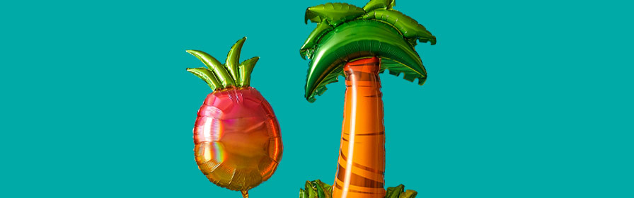 Pineapple and palm tree balloons on teal background