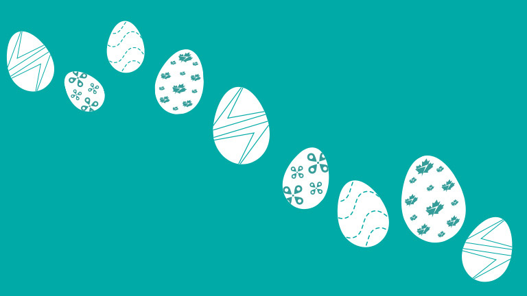 Easter eggs on teal background