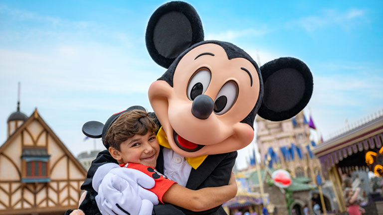 Mickey Mouse and child at Walt Disney World Resort
