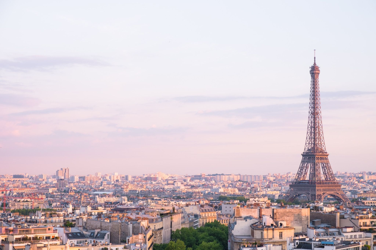 sunset over Eiffel tower in Paris , France
