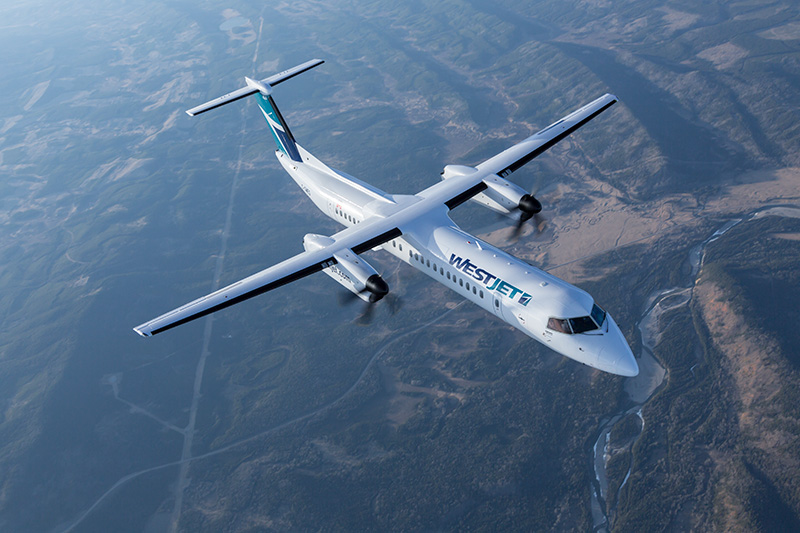 WestJet Airlines Bombardier Q400 NextGen photographed on April 22, 2015 from Wolfe Air Aviation's Learjet 25B.